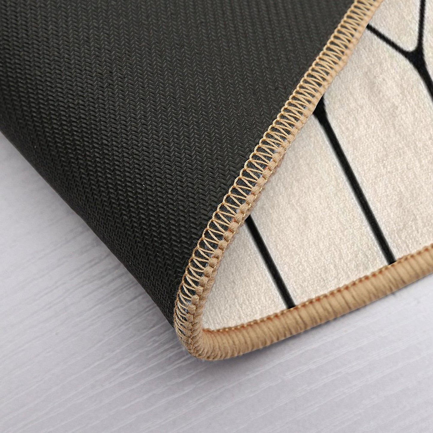 Long Honeycomb Minimalist Geometric Pattern in Black And Almond Cream Bath Mat