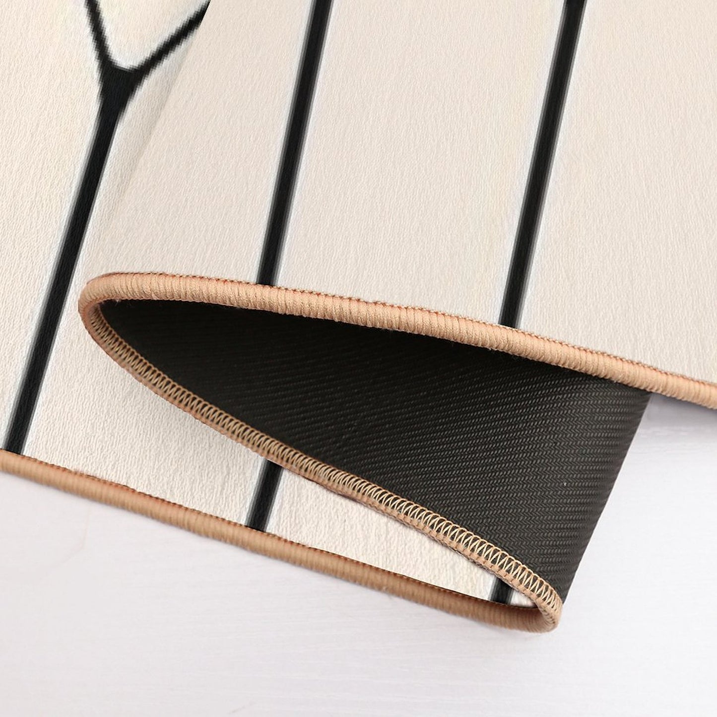 Long Honeycomb Minimalist Geometric Pattern in Black And Almond Cream Bath Mat