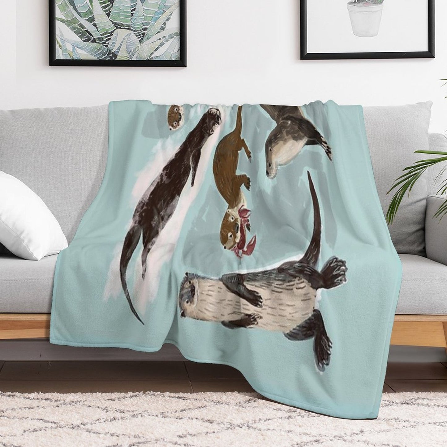 New World Otters Throw Blanket