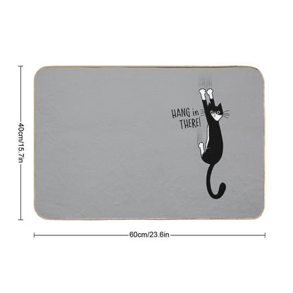 Tuxedo Cat Hanging On Hang In There! Funny Cat Hanging On With Claws  Long-Lasting Bath Mat
