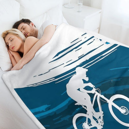 Silhouette of A Cyclist Riding A Mountain Bike Throw Blanket