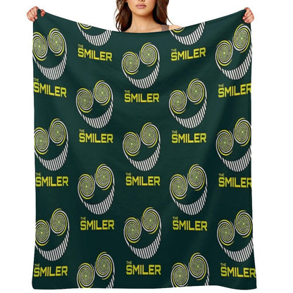 The Smiler Throw Blanket