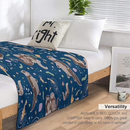 Sea Otters at Night Throw Blanket