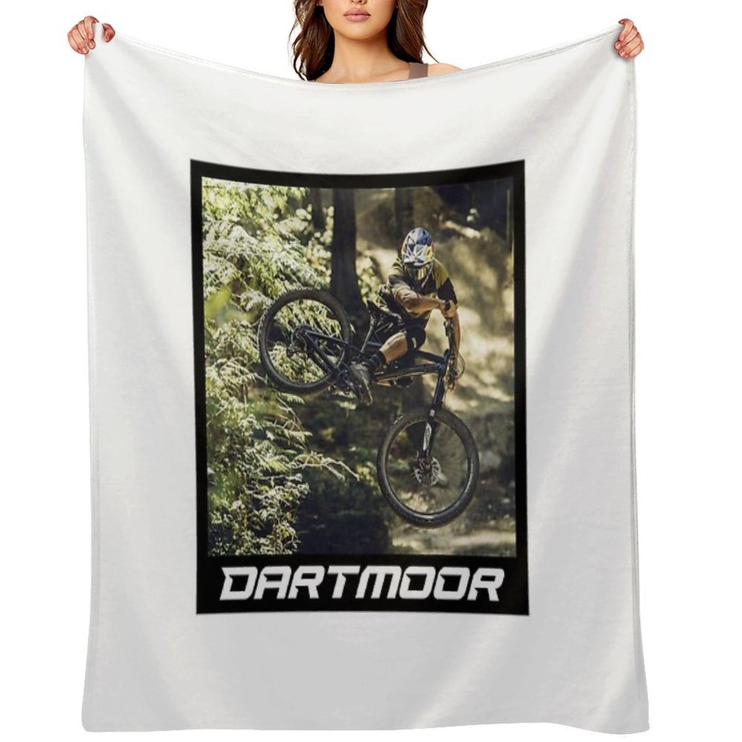 Cyclist Jumping with His Dartmoor Bikes Throw Blanket