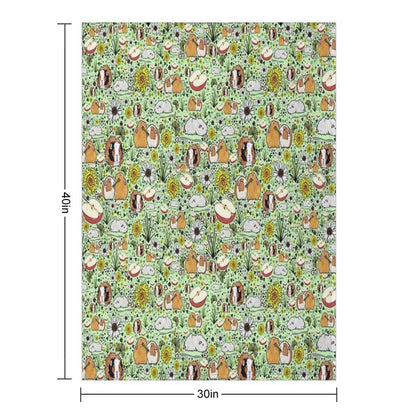 Guinea Pigs in Green Throw Blanket