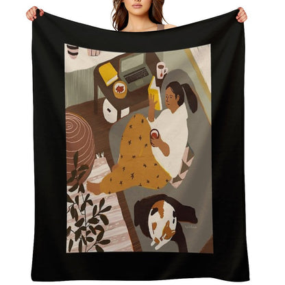 Girl Is Reading A Book at Cozy Home Interior with A Cat Throw Blanket