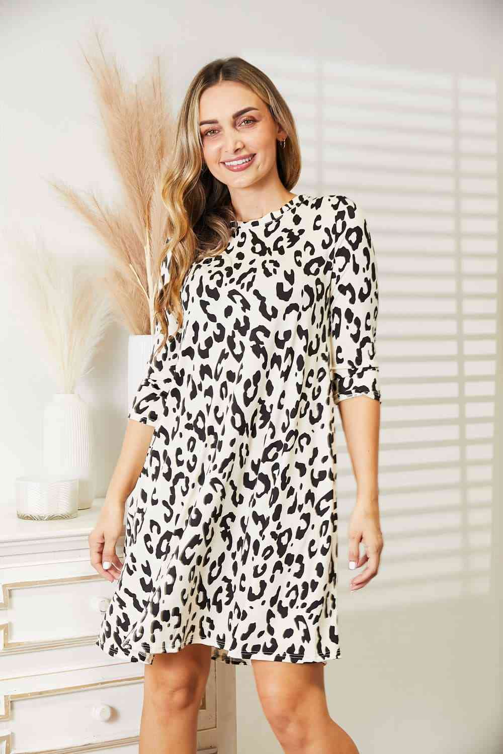 Celeste Full Size Leopard Three-Quarter Sleeve Dress with Pockets